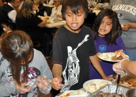 Kids enjoying the feast.
