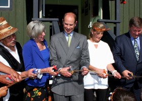 The Earl and Countess of Wessex, Prince Edward and Princess Sophie, join dignitaries to cut the ribbon of the new library at Ditidaht
