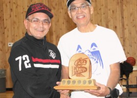 Coach of the Tournament: Francis Frank (left) with award namesake Wally Samuel Sr.