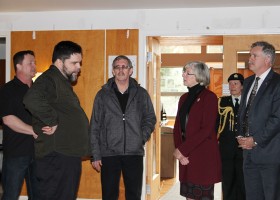 In the meeting hall at Hupacasath, Chief Councillor Steven Tatoosh visits with the Lieutenant Governor