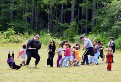 Samantha Edgar leads a team in the crowd favourite game of tug-o-war.