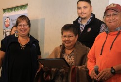 Audrey Smith was blanketed on Sept. 19. To her left is NTC President Judith Sayers, with NTC Vice-President Andy Callicum and Nuchatlaht Councillor Archie Little.
