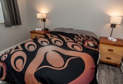 The duvet cover in Chims Guest House is decorated with Aboriginal art.