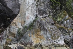 A pictograph of a bird is still very visible on a rock face in Hannah Channel. Ray Williams recalls a harpoon and cedar rope being found in a nearby cave.