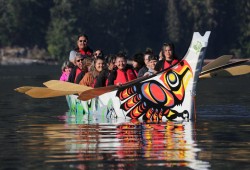 A traditional Nuu-chah-nulth canoe approaches Canal Beach on Oct. 6.