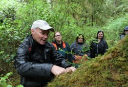 Dave Pinel, manager of West Coast Expeditions, explains the intricacies of tree moss on Spring Island in Kyuquot Sound. 