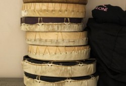 A pile of drums sit in Cory Howard's house. He built them during COVID-19 so that he is better equipped to teach other men how to when they are allowed to gather again.