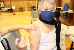 Regina Martin receives her COVID vaccine
