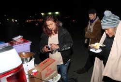 Jacquie Dennis hands out food behind Port Alberni’s Safe Injection Site in November 2022, in an effort to help those in the area suffering from the effects of homelessness and addiction. (Eric Plummer photo)