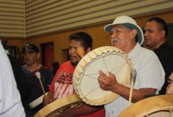 Tyee Ha'wilth Maquinna (Lewis George) drums with others at the gathering.