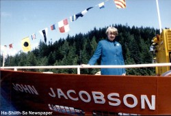 Joan Jacobson stands aboard a Canadian Coast Guard vessel in 1991 when it was named after her late husband.