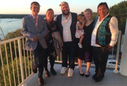 Pictured are family members (left to right) Timmy Masso, Jessie Masso, Hjalmer Wenstob, Anika Beniot-Jansson holding Huumiss and Trent Masso.