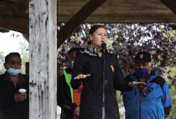 Nuu-chah-nulth Tribal Council vice-president Mariah Charleson speaks to a crowd of people gathered in Tofino's Village Green to honour the survivors and victims of the residential school system on the first National Day for Truth and Reconciliation, on September 30, 2021.