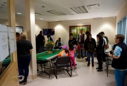 People gather in the All Nations Room during the grand opening event at West Coast General Hospital on Oct. 11. 