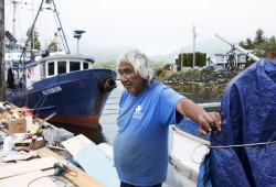Charles Webster helped his cousin to replace the rotting stern of his boat before heading out commercial fishing, in Ucluelet.