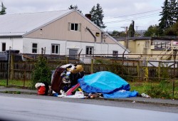 A makeshift tent is set up outside Port Alberni’s Wintergreen Apartments on Fourth Avenue last year. The province of BC has committed more than $600 million to tackle homelessness in their 2022 budget. (Karly Blats photo)