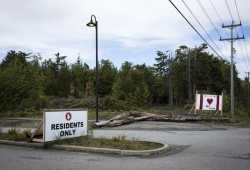 A "resident's only" sign is mounted at the entrance of Ty-Histanis as the community continues to monitor incoming and outgoing traffic, on Friday.