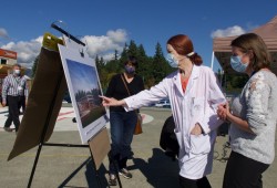 Staff look over designs for renovations to the West Coast General Hospital’s emergency department, which sees over 25,000 patients a year, many of whom don’t have access to a general practitioner. (Island Health photo)