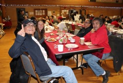 Chuck August and friends enjoying Christmas lunch.