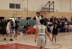 Maaqtusiis player Chancellor Hayes puts one up for three at On the Edge Basketball tournament in Ucluelet on Dec. 7.