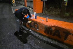 Tseshaht members cleaned up the damage within hours of it happening late on the night of January 14 to scrub the freshly painted slur off of the barricade. (Facebook photo)