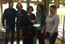 Partners on a Rainforest Field School at Ucluelet Elementary School, Rain Forest Education Society and Ucluelet Elementary School share a happy moment with Rebecca Hurwitz, CBT Executive Director at the Vitals Grants Awards.  