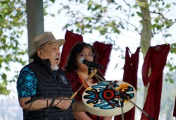 William Good, Hereditary Chief from the Snuneymuxw First Nation, waits to play an opening prayer song at the march for Lisa Marie Young on June 30 in Nanaimo. 