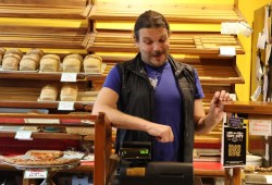 Common Loaf Bake Shop’s Lee McNamee rings in a cup of coffee.