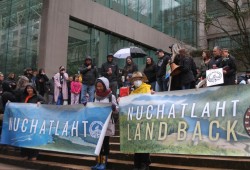 Nuchatlaht members and supporters stand on the steps of the B.C. Supreme court on March 21, 2022, when the First Nation began its Aboriginal title trial. (Eric Plummer photo)
