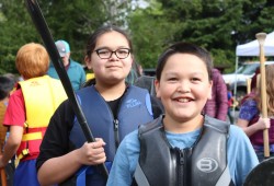 Students from DCS, Stz’uminus Community School in Ladysmith and École des Grands-cèdres in Port Alberni eagerly swarmed a pile of lifejackets and lined up in two rows: one for beginners and the other for experienced paddlers.