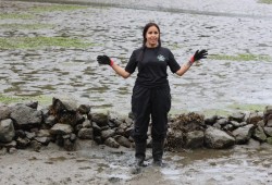 In her happy place, Tla-o-qui-aht Tribal Park Guardian Gisele Martin says she’s thankful for the help, and so are the clams.
