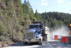 In the spring Bamfield Main was subject to delays, detours and single-lane alternating traffic, as work intensified building up the road with gravel. (Eric Plummer photo)