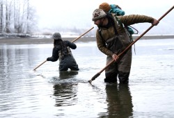 Rachel and Spencer Greening, with their child Maaya’ol, harvest seafood on the Pacific Northwest Coast. (Troy Moth photo)