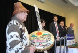 Snuneymuxw elder Xulsimalt sings during the announcement of the First Nations Justice Strategy in Nanaimo on March 6, 2020. (Eric Plummer photo)