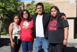 Dontay's father Patrick Lucas stands with family outside the Port Alberni Law Courts on June 12, 2023, where a preliminary inquiry was underway for murder charges in his son's death. (Denise Titian photo) 