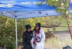 Lisa Marie's aunt Carol Frank speaks at the tree-planting event.