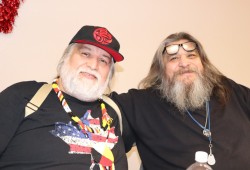 Brothers Randy and Robert Belleque of the Ka:'yu:'k't'h'/Che:k'tles7et'h' First Nations enjoy a meal together in Seattle. (Denise Titian photo)