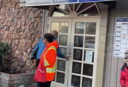 People gather at a downtown soup kitchen. Campbell River has nearly 200 people experiencing homelessness, according to a 2023 point-in-time count, and half of those identified as Indigenous. (Nora O’Malley photo)