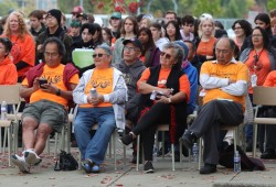 Former residential school students attend a flag raising ceremony at ADSS on Sept. 28.