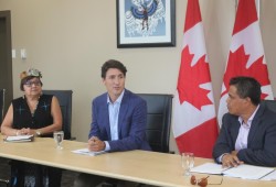 Prime Minister Justin Trudeau met with Nuu-chah-nulth leaders in Tofino on Aug. 5, 2017 to discuss reconciliation and other concerns of the individual Nations. Pictured are Trudeau with former Nuu-chah-nulth Tribal Council president Debra Foxcroft and Elmer Frank, chief councillor of the Tla-o-qui-aht First Nation. (Heather Thomson photo)