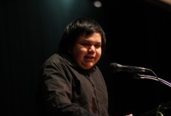 Eighth Avenue Learning Centre graduate Julius Joe speaks during that June 20 ceremony. (Eric Plummer photo)