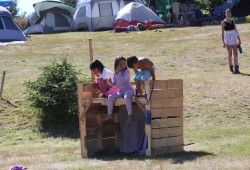 Youngsters play in Yuquot's field.