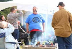 Michael Hunt supported the event by tending to the fire all day. He says the fire is a safe place to sit and talk.