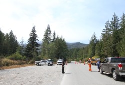 A driver is stopped at a barricade south of Port Alberni, where Franklin River Road is closed due to the Mount Underwood wildfire. 