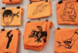 Original Orange Shirts created by Ucluelet Secondary School Grade 9 students of Shannon McWhinney’s art class will be for sale at the exhibit on Sept. 30. The middle drawing is an eagle designed by Earl Frank that reminds him of his mom and grandma.