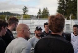 Toquaht Nation member Phil Mack, in centre with hat, served as the attack coach for the national men's rugby team this year. (Rugby Canada photo)