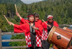 Japanese Taiko drummers perform at Ucluelet’s Village Green on Aug. 29 after the opening of the pavilion. (Geoff Johnson / Ukee Tube photo)