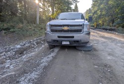 The road’s closure has forced those living in and visiting southwestern Vancouver Island communities to use a provincially approved route from Lake Cowichan. A series of often-rugged logging roads that begin west of Youbou, this detour has added many hours to those seeking the services they regularly rely on in Port Alberni. Pictured is a damaged vehicle near the Ditidaht First Nation community at Nitinaht Lake. (Judi Thomas photo)