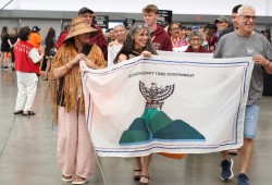 Members of the Uchucklesaht Tribe paraded into the main hall on Aug. 26.