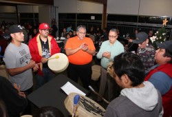 People sing and drum during an urban gathering held in Vancouver in December 2019. (Eric Plummer photo)